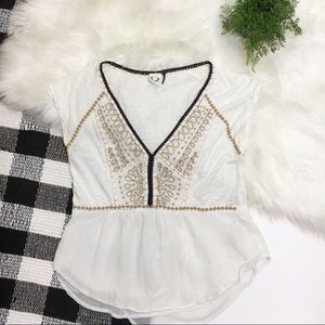 Anthropologie Embroidered accent cream v neck